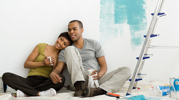 Couple taking a break from painting Couple taking a break from painting